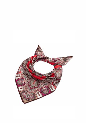 Red silk scarf with intricate paisley and floral patterns, arranged in a loose knot on a white background.