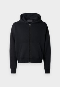 Czarna bluza z kapturem na zamek, wykonana z miękkiego materiału, z przednią kieszenią, w oversize'owym fasonie oraz zaokrąglonym kapturem. Posiada ściągacze na rękawach i na dole.