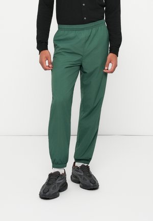 XH8909_SKB - Jogginghose - green