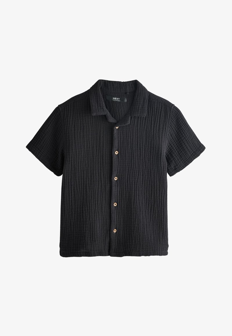 Chemise noire texturée à manches courtes avec col et cinq boutons beige sur le devant.