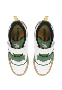 White athletic shoes with green accents, velcro straps, rubber soles, and a yellow logo reading "U.S. POLO ASSN." on the strap.
