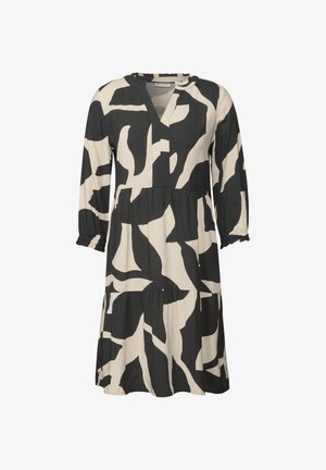 Abito midi a maniche lunghe con stampa astratta in bianco e nero, dotato di colletto arricciato e gonna a strati.