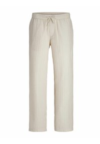 Pantalones de color crema claro, texturizados, de corte relajado, con cintura elástica y cordón. Presentan rayas verticales en toda la tela.