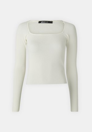 Top de manga longa, com textura em canelado, na cor off-white, apresentando um decote quadrado e um design justo. Feito de um tecido macio e elástico.