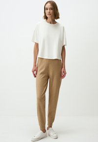 HIGH WAIST JOGGER - Pantaloni sportivi - beige