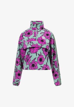 Fleece pullover in turquoise met een roze bloemenpatroon, hoge kraag, halve ritssluiting en een voorvak met contrasterende tekstdetails.