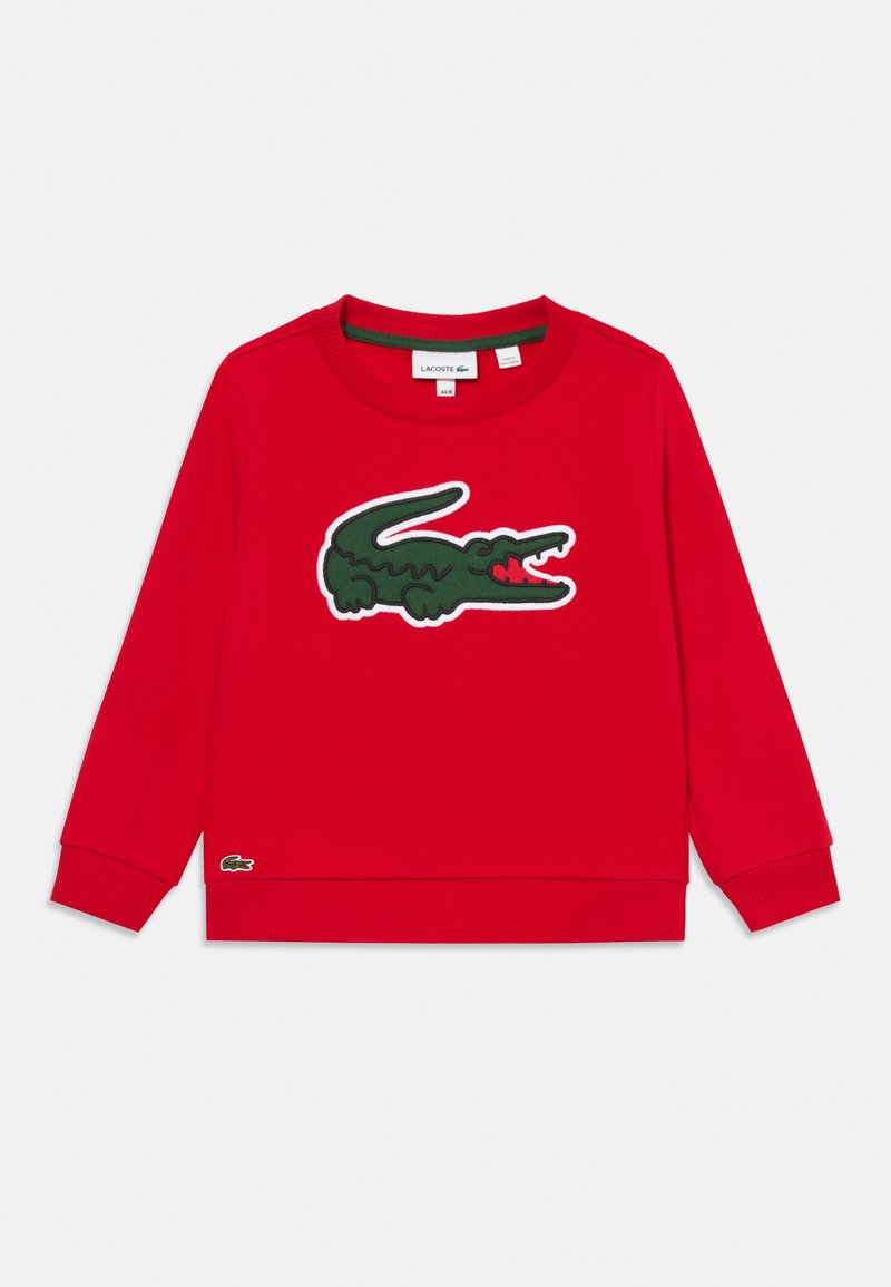Sudadera roja de manga larga con puños acanalados, un gran logo de cocodrilo verde centrado en el frente y un logo más pequeño cerca del dobladillo.
