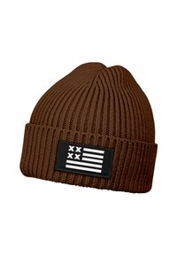 Brown knitted beanie hat with a ribbed texture. Features a black patch with stylized white flag design. Classic, fitted shape.