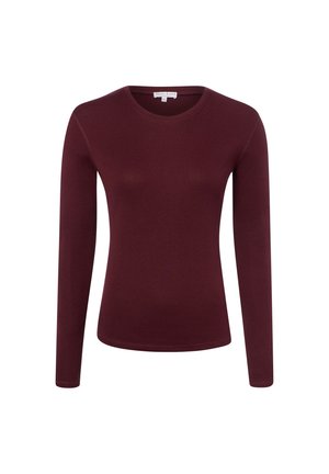 Donker bordeauxrode, nauwsluitende longsleeve met ronde hals, met zichtbare stiksels langs de naden en een klein wit label aan de binnenkant van de halslijn.