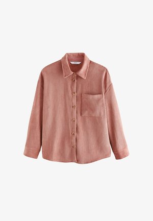 Camicia in corduroy color ruggine con colletto, maniche lunghe, chiusura frontale con bottoni e una tasca sul petto.