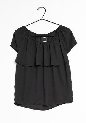 Haut noir à manches courtes avec un col élastiqué et un design en volants superposés. Fabriqué en tissu léger, avec un ourlet incurvé.