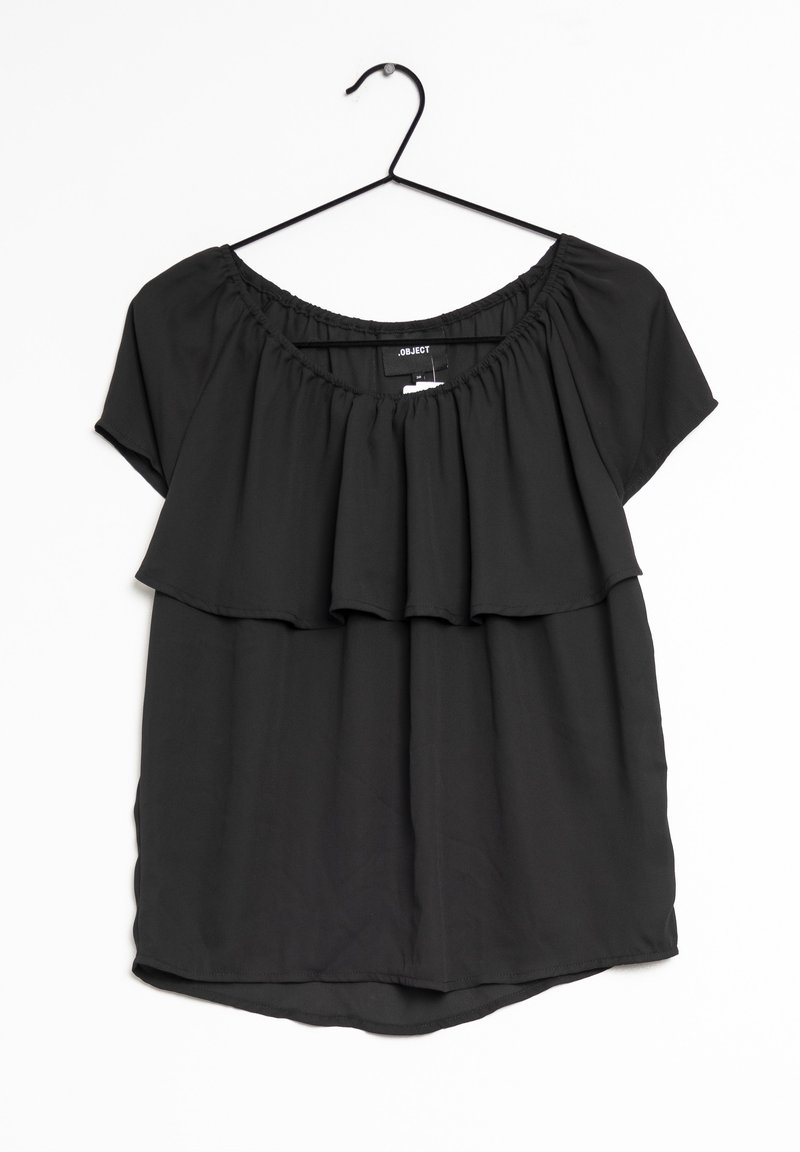 Schwarzes, kurzärmliges Oberteil mit elastischem Ausschnitt und geschichteter Rüschengestaltung. Hergestellt aus leichtem Stoff, mit abgerundetem Saum.