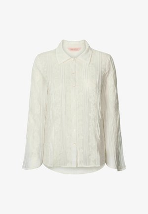 Biała, długorękawowa bluzka na guziki z kwiatowym haftem i spiczastym kołnierzykiem, oznaczona jako Odd Molly.