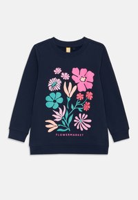 Kék pulóver színes virágmintával, rózsaszín, zöld és barack színű virágokkal. Kerek nyakkivágás és bordás mandzsetta "FLOWERMARKET" felirattal.