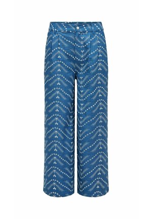 Pantalones azules de pierna ancha con patrones geométricos y florales bordados en blanco, botones delanteros y bolsillos laterales.