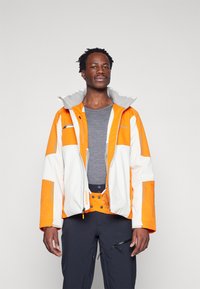 Spyder TITAN JACKET - Jachetă schi - orange shock