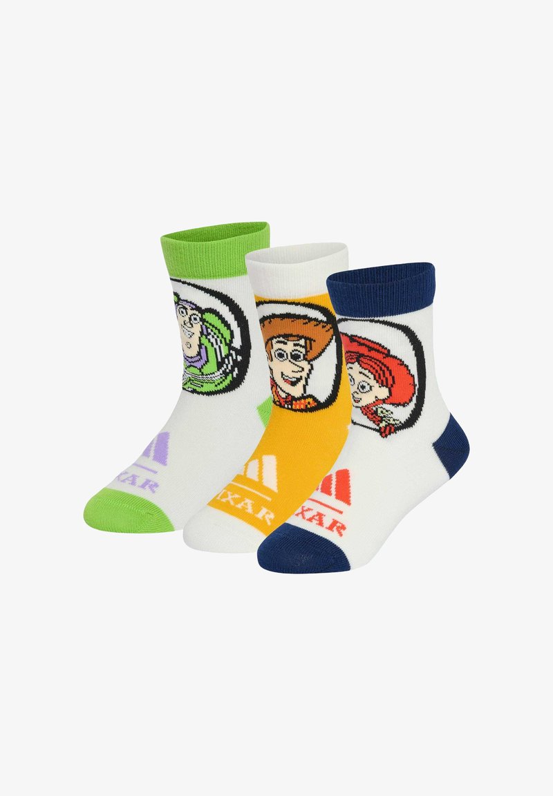 Trois chaussettes colorées sur le thème Pixar avec Buzz l'Éclair à bordure verte, Woody à bordure jaune, et Jessie à bordure bleue.
