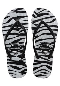 Infradito Havaianas con un motivo a strisce zebra in nero e argento, caratterizzati da una suola testurizzata e cinturini in gomma nera. Taglia EUR 39/40.