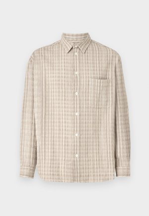 Button-up shirt in light beige, featuring a checked pattern, long sleeves, a chest pocket, and a regular collar design.