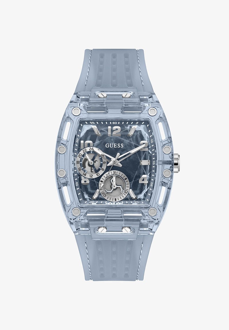 Διαφανές μπλε ρολόι Guess με τετράγωνο καντράν, ασημένιους δείκτες ώρας, δύο υποκαντράν και λουράκι σιλικόνης με ραφές.