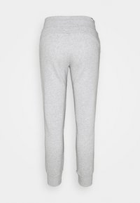 Grå bomulds sweatpants med et tapered ben design, elastisk talje, glat tekstur og minimale syninger, med sidelommer.