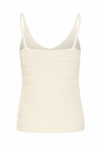 Crochet tank top in cream, featuring a close-knit texture, thin shoulder straps, and a straight neckline. Simple, fitted design.