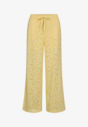 Yellow wide-leg pants with embroidered floral cutout patterns and a front drawstring waist.