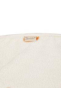 Creme-farbenes Fleece-Decke mit weicher Textur und subtilen orangefarbenen Punkten, versehen mit einem beige Etikett, auf dem in Kursivschrift "Stemtnaler" am Rand steht.