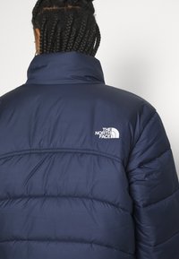The North Face Zimní bunda - dark blue