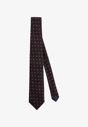 Navy tie with a textured fabric featuring a repeating geometric pattern in gold. Tapered end with a pointed tip.