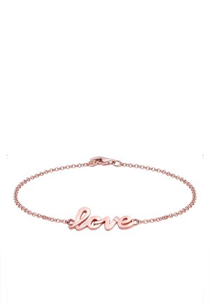 Bracelet en or rose portant le mot "amour" en écriture cursive, soutenu par une fine chaîne avec un fermoir à homard.