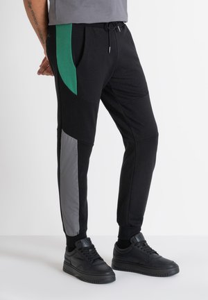 Pantalones deportivos - black