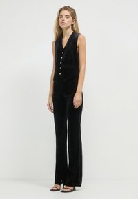 Calliope A ZAMPA - Pantaloni - ultrablack