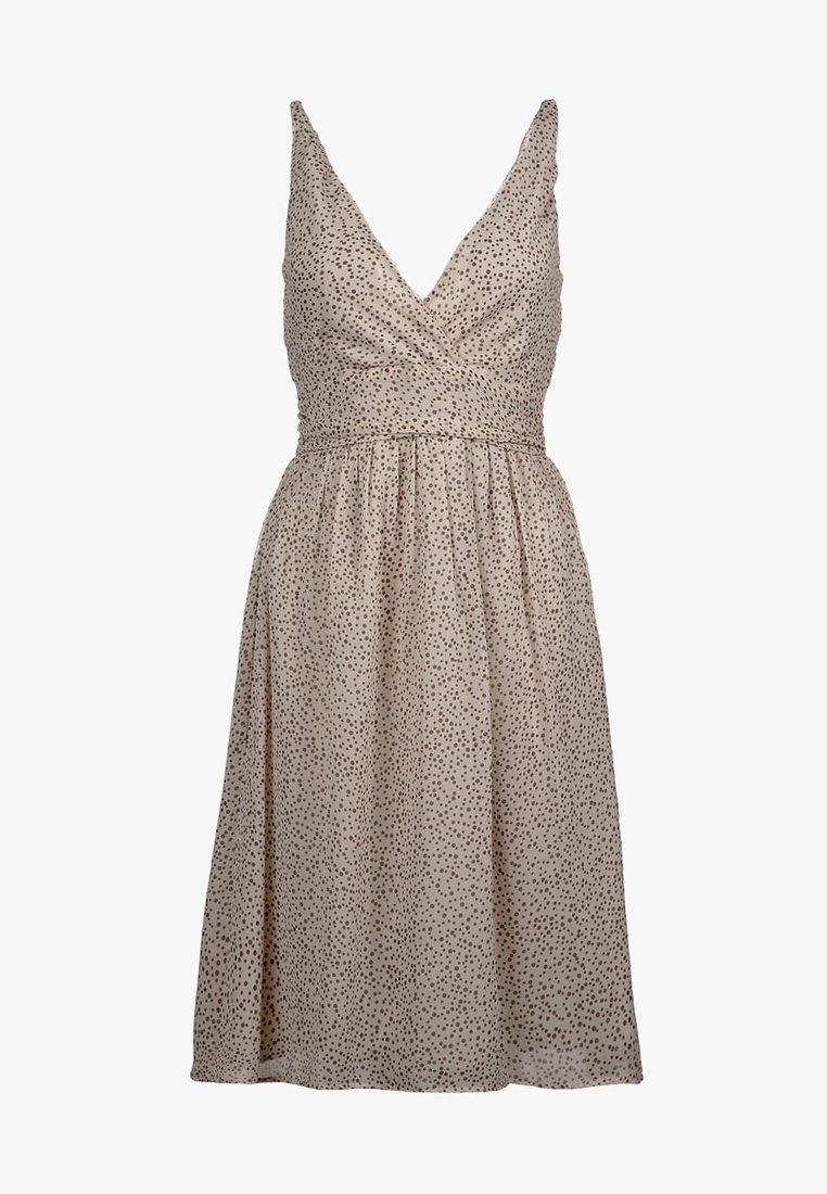 Robe beige avec un décolleté profond en V, taille froncée et jupe évasée. Présente un motif à pois dans des nuances plus foncées sur toute la surface. Tissu léger.