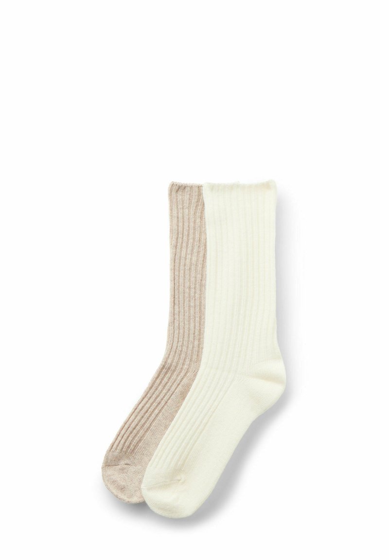 Skarpetki prążkowane w dwóch odcieniach: jasny beż z jednej strony i kremowy z drugiej. Miękka tekstura, standardowa długość crew, bezszwowy design palców.