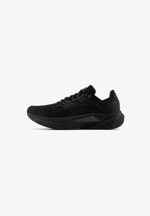 Black athletic shoe with textured upper, lace closure, and a chunky sole. Features breathable mesh and embossed patterns for added grip.