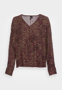 Langärmliges, burgunderfarbenes Oberteil mit V-Ausschnitt, das ein strukturiertes Zebra-Streifenmuster in Beige und Schwarz aufweist. Weicher, leichter Stoff.