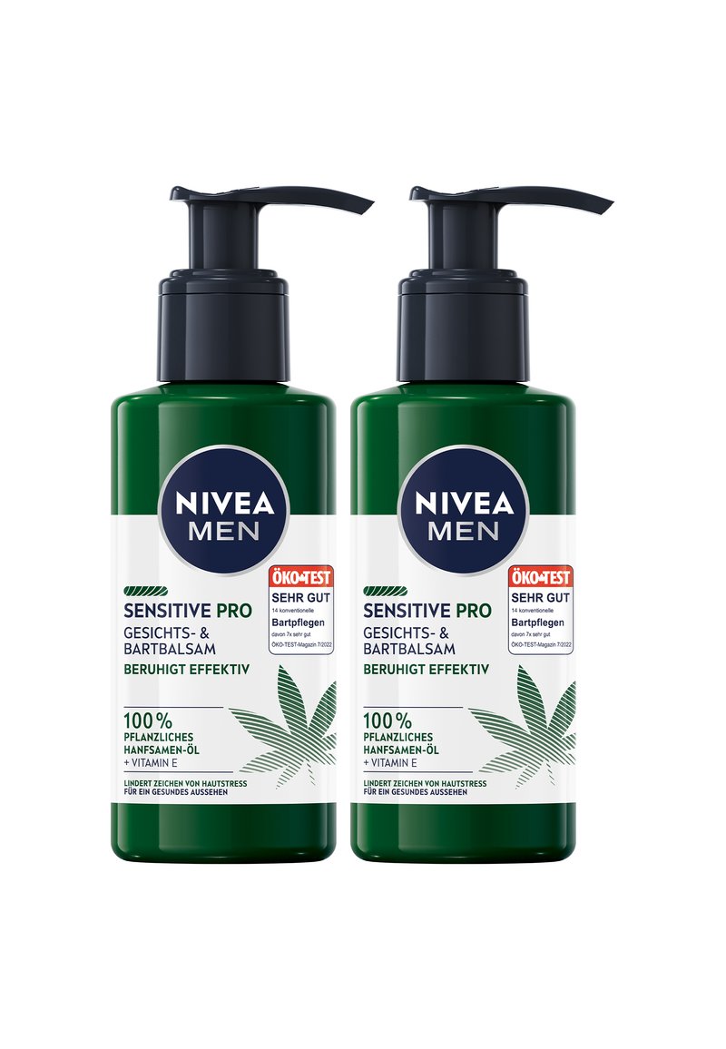 Two green bottles of Nivea Men Sensitive Pro Facial and Beard Balm, featuring a pump top, white labels, and a leaf pattern.