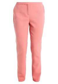 Lichtroze broek gemaakt van gladde stof, met een getailleerde pasvorm, platte voorkant en zijzakken. Schone lijnen en enkellang ontwerp.