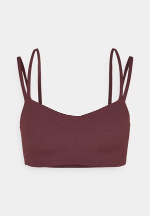 Burgunderbralette med en glatt tekstur, skrå utringning og tynne doble stropper. Enkel, sømløs design uten metallkomponenter eller dekorasjoner.