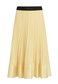 Jupe midi plissée jaune clair, avec une ceinture élastique noire et un ourlet satiné. Texture lisse avec un léger éclat.