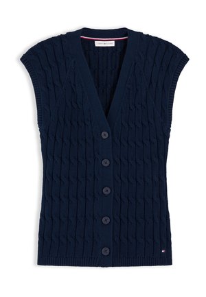 Navy blue sleeveless cable-knit cardigan vest with five buttons down front and small Tommy Hilfiger logo near hem.