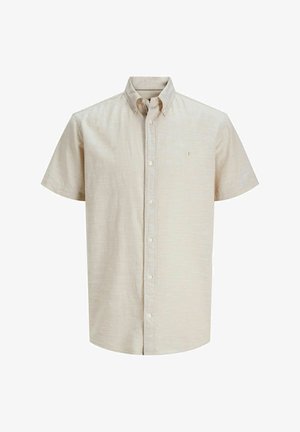 Chemise à manches courtes en tissu beige clair avec une texture subtile, dotée d'un col standard et d'un petit logo sur la poitrine.