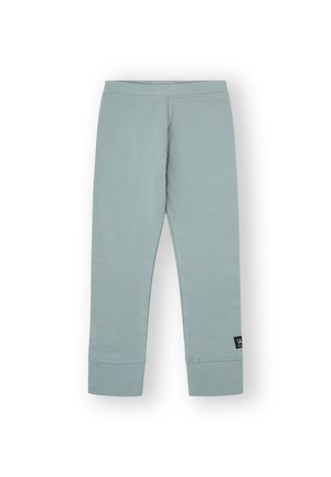 Leggings de algodón grises con un diseño ajustado, que cuentan con una cinturilla cómoda y puños rectos; incluye una pequeña etiqueta de logo en el lateral.