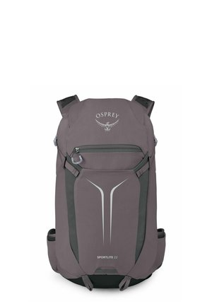 Sac à dos gris Osprey Sportlite 22 avec poche avant zippée, design réfléchissant, bretelles rembourrées et poches latérales en mesh, présenté sur fond blanc.