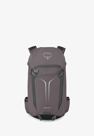 Sac à dos gris Osprey Sportlite 22 avec poche avant zippée, design réfléchissant, bretelles rembourrées et poches latérales en mesh, présenté sur fond blanc.