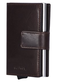 Brown leather wallet with metallic card holder, secured with a strap. Features embossed logo and minimalist design.