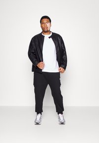 SIKSILK EXTENDED - Cargobukse - black