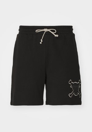 PUMA X ONE PIECE - Pantalones deportivos - black