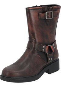 Ruskea tekonahkainen nilkkabootsi, jossa on solki- ja remmidetailit, pyöristetty kärki ja matala lohko korko. Teksturoitu pinta lisää syvyyttä.